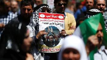  Palestinians take to streets to mark Prisoners Day