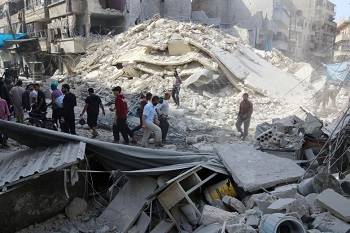 Scores dead after Aleppo pounded in aerial onslaught