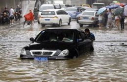 China flood death toll nears 1,000