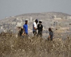 Israeli settlers attack dozens of protestors