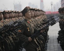 Koreas exchange gunfire at land border